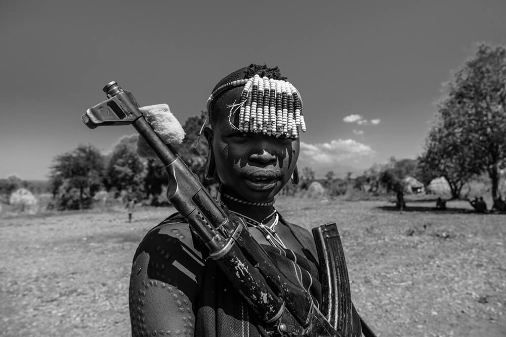 A Mursi with an AK-47