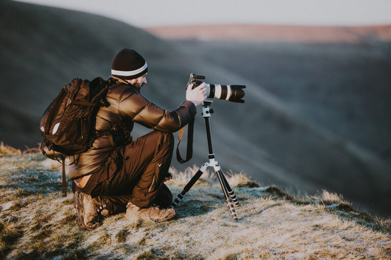 Photographer with backpack in the outdoors