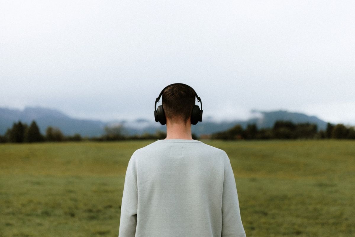 Man in Field with Headphones