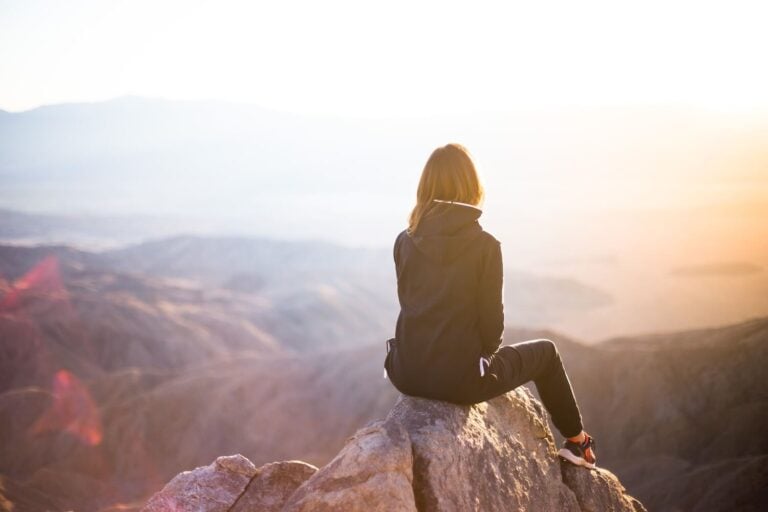 Girl with a Jacket Staying Warm in Nature